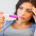 girl taking a pregnancy test rather than birth control