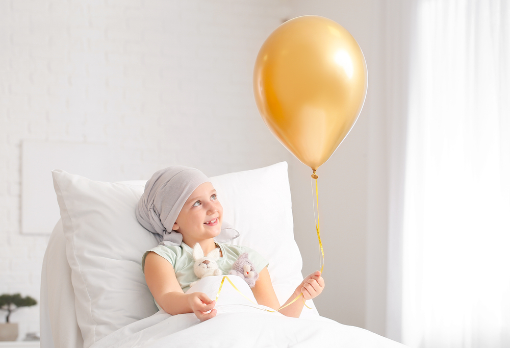 cancer child with balloon